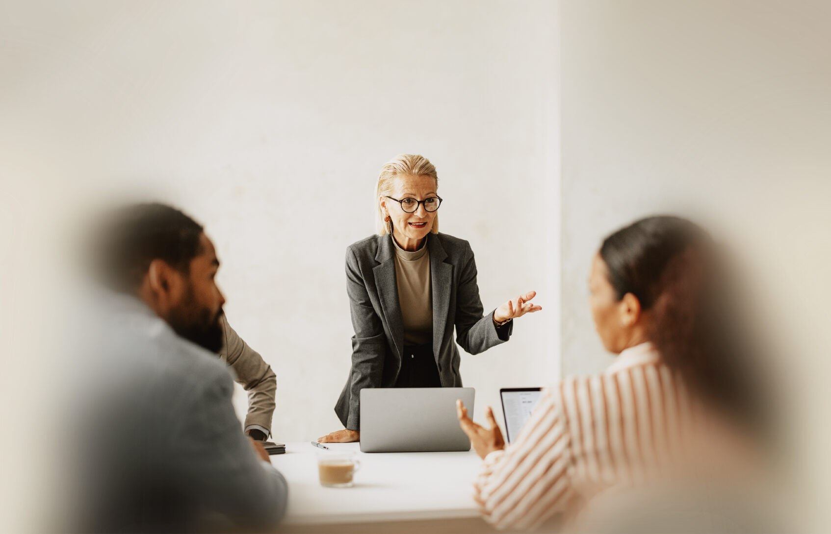Businesswoman leading team meeting.