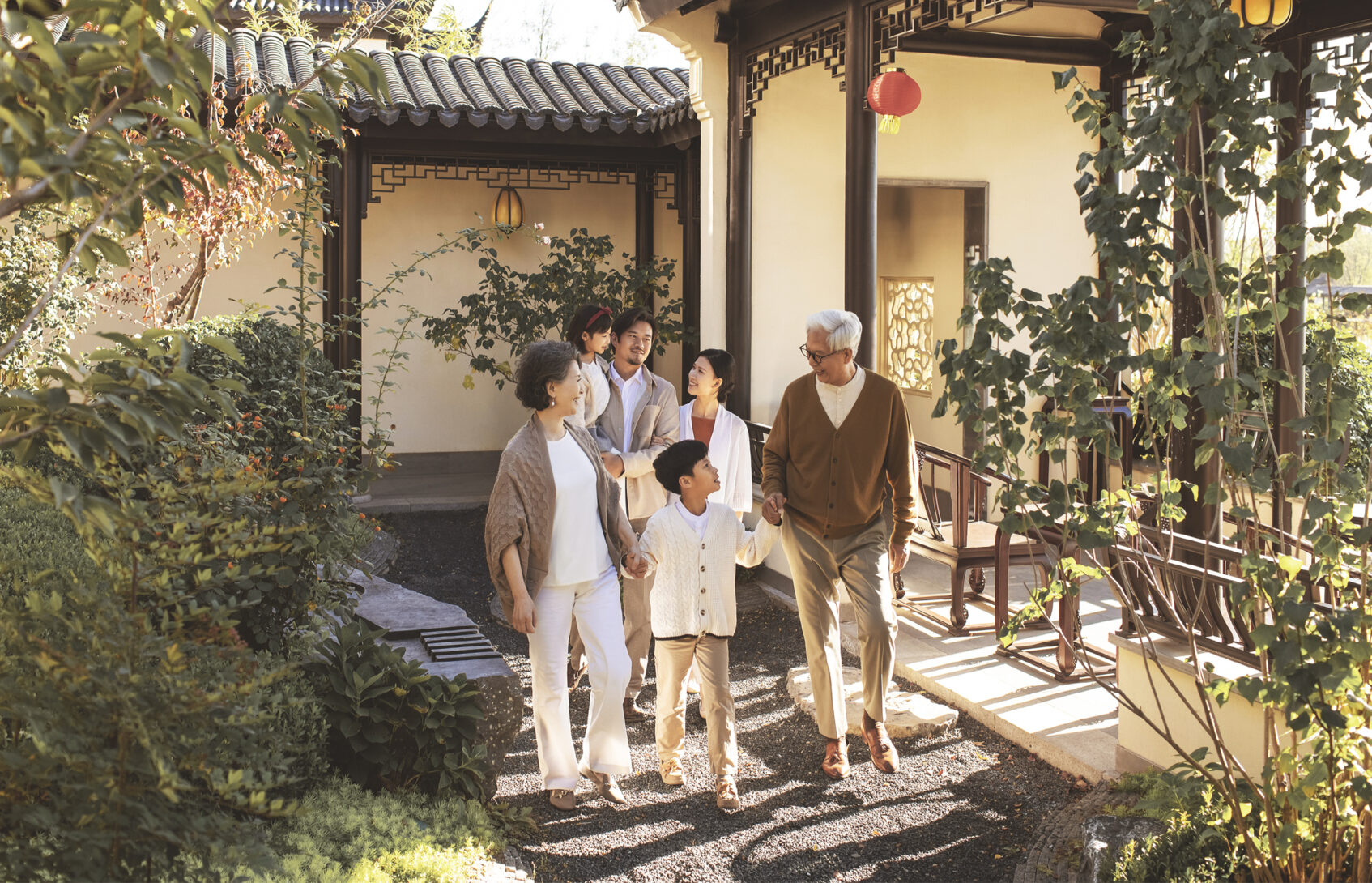 Family taking a walk in the park.